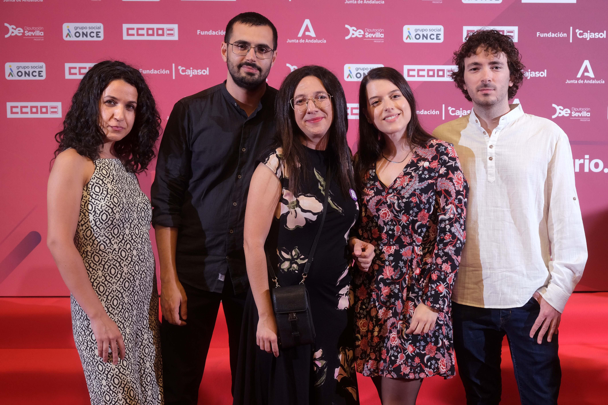 Lourdes Perona, una de las premiadas, junto a sus acompañantes