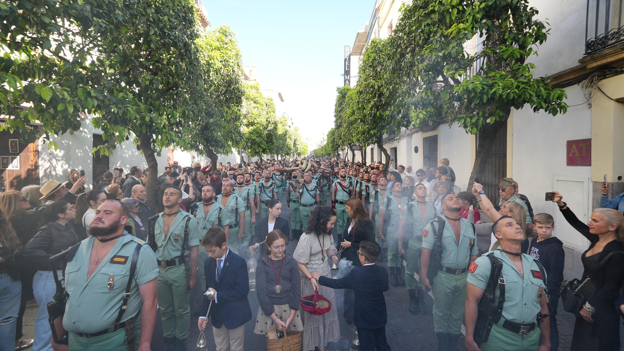 El vía crucis de La Caridad, en imágenes