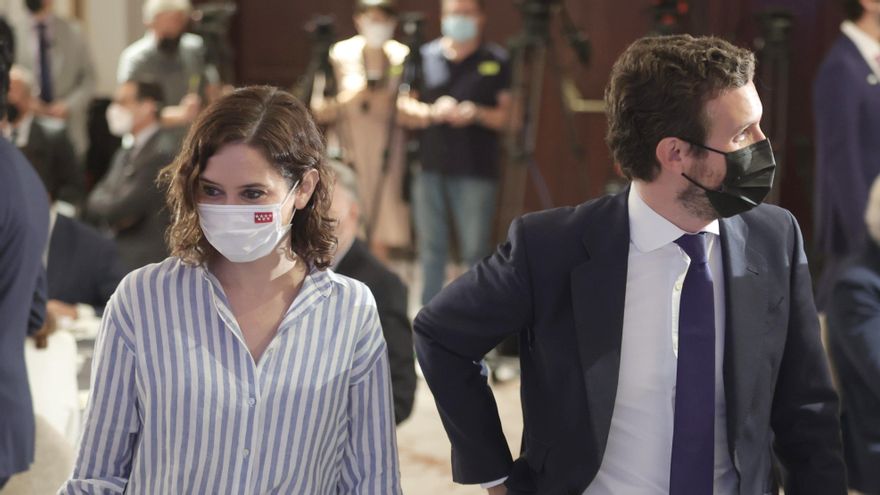 La presidenta de la Comunidad de Madrid, Isabel Díaz Ayuso, y el líder del PP, Pablo Casado.