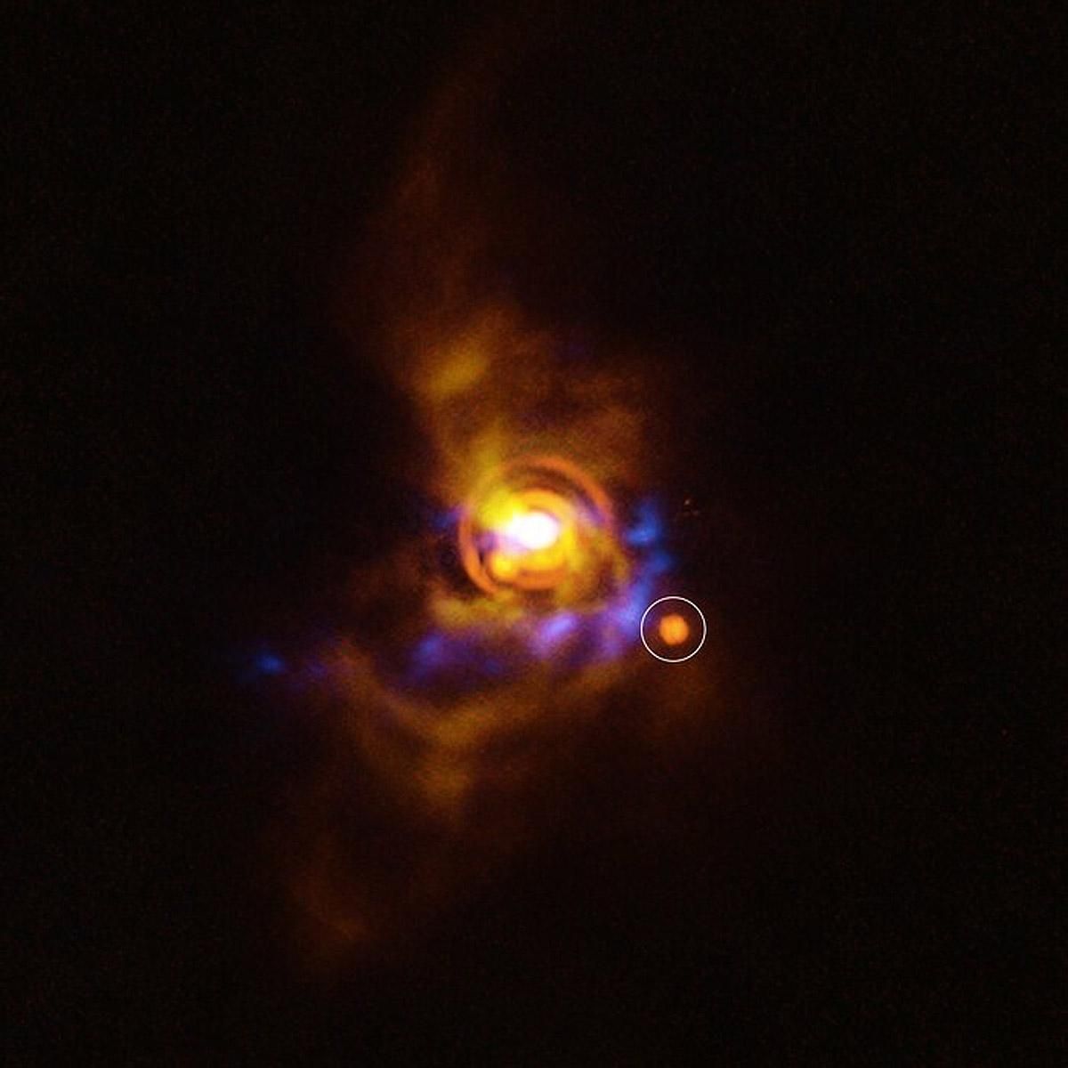 Posible astro compañero orbitando alrededor de la joven estrella V960 Mon.