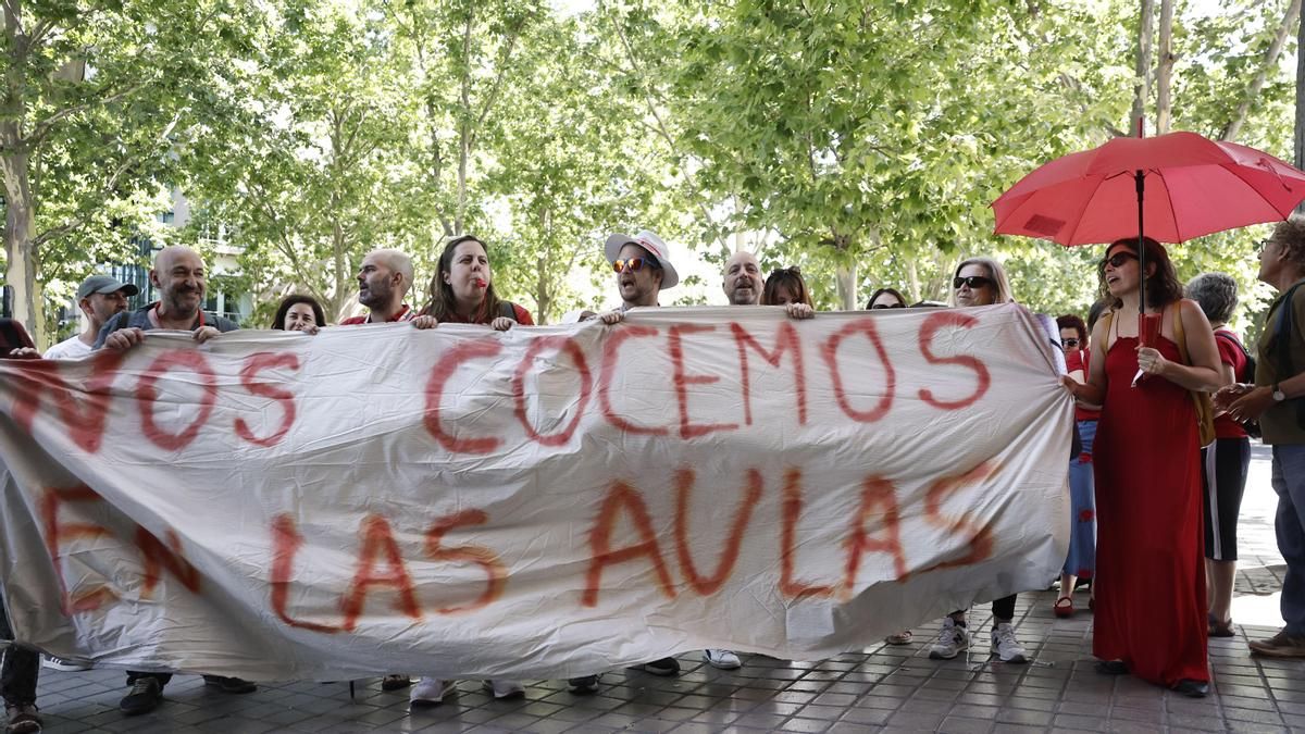 La pelea de las familias contra el calor en las aulas y el negacionismo climático de Ayuso arranca una inversión histórica