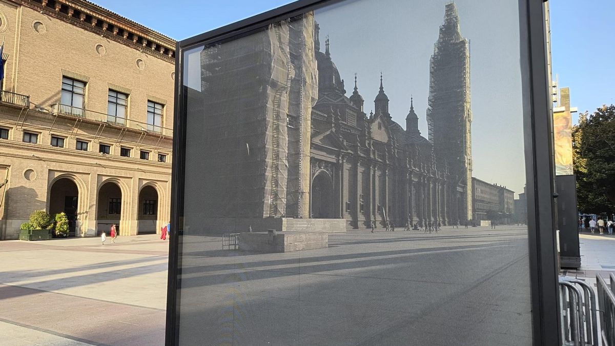 Ayuntamiento de Zaragoza y el Pilar reflejado en una pantalla.