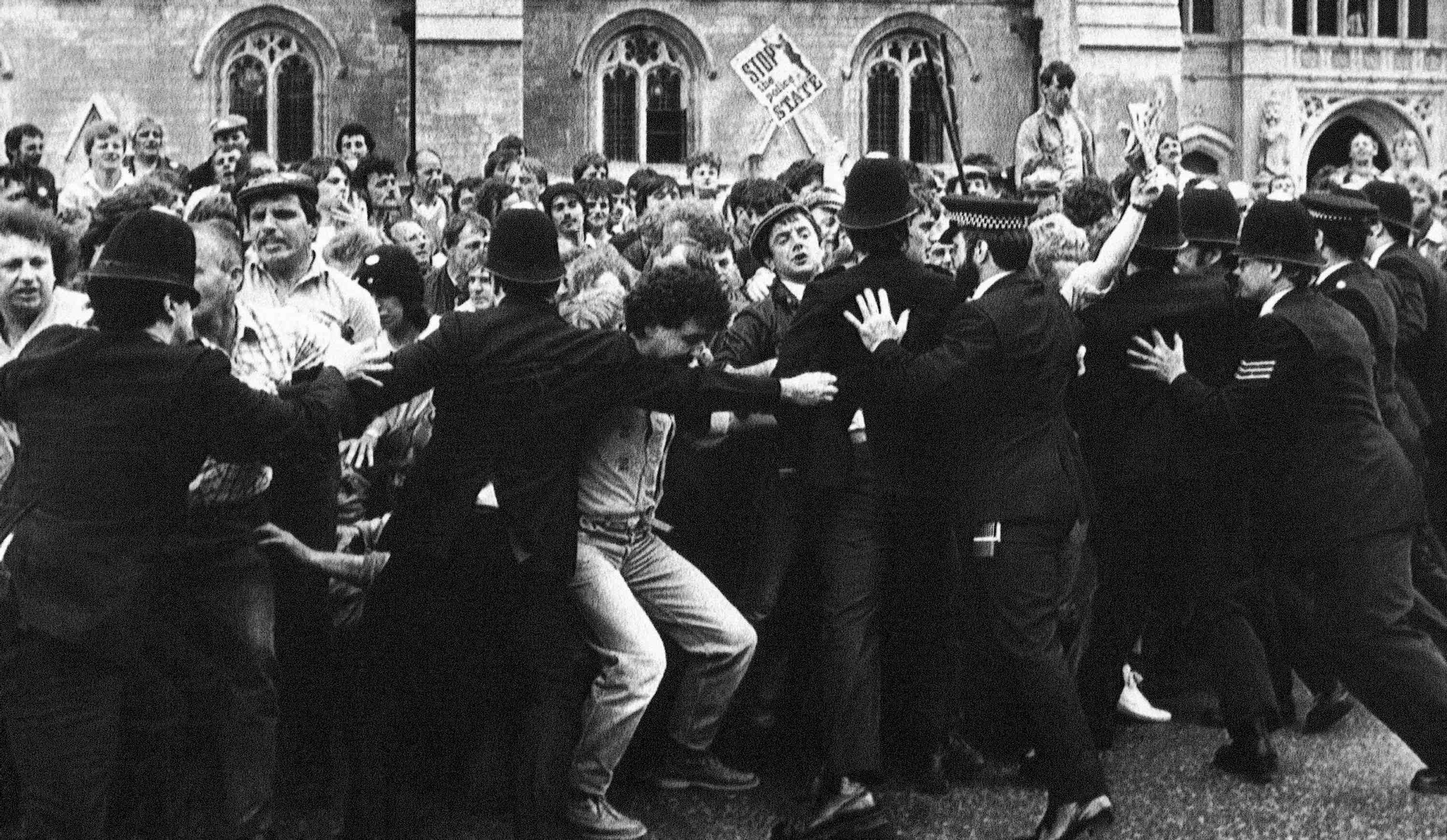 Police hold back striking coalminers in front of Britain’s House of Commons in London on Thursday, June 7, 1984, when the two sides clashed there as an estimated 6,500 miners demonstrated in support of an often-violent walkout over mine closures and job cuts. A number of miners and some youngsters, believed to be children of strikers, were reported to have been injured. An undisclosed number of strikers were arrested. (AP Photo/Joe Schaber)