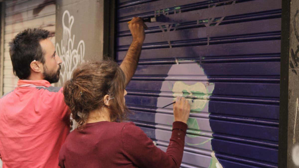 El dúo Llomesh trabajando en uno de los cierres que fue después pisado