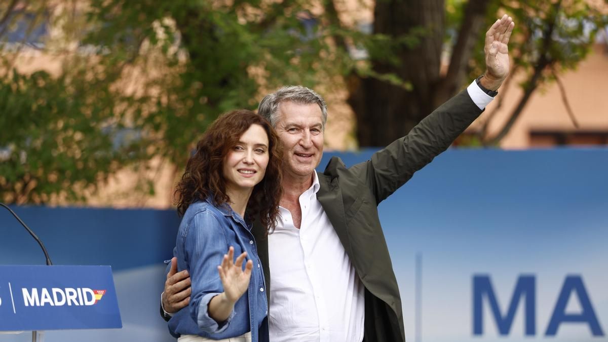 Alberto Núñez Feijóo e Isabel Díaz Ayuso durante el acto de inicio del curso político del PP de Madrid celebrado este sábado en Getafe.