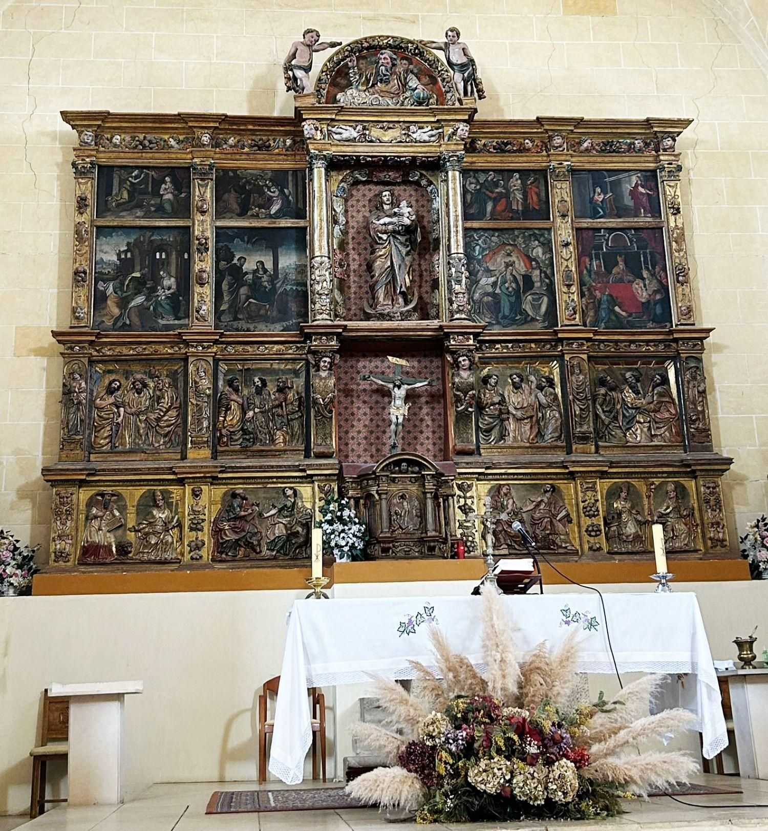 Retablo renacentista de la iglesia de Palanquinos.