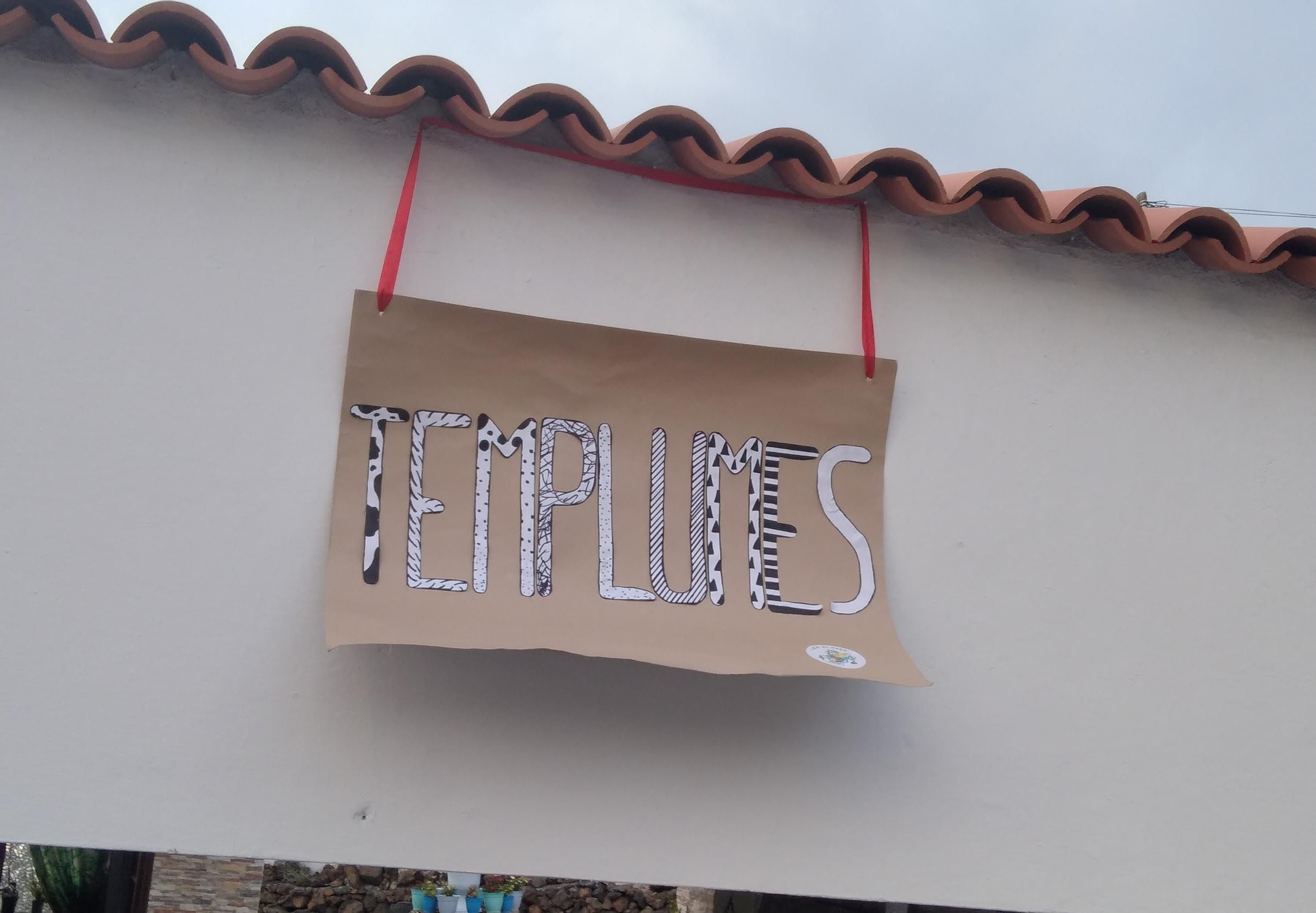 Cartel con la palabra 'templumes'. DILIA, IRENE GONZÁLEZ Y BRYAN
