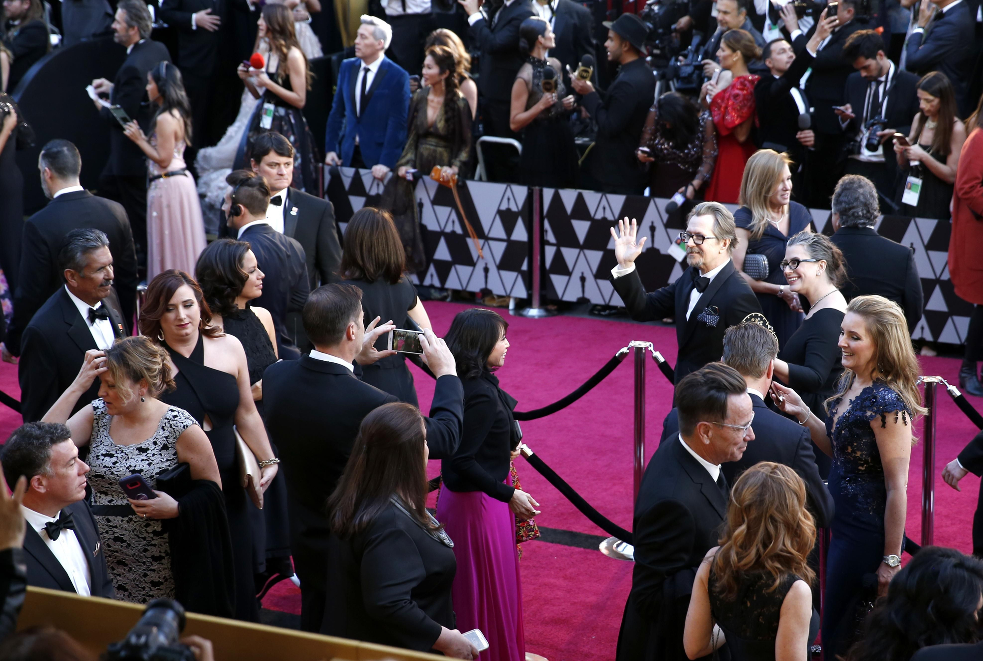 Gary Oldman y Gisele Schmidt, en el photocall