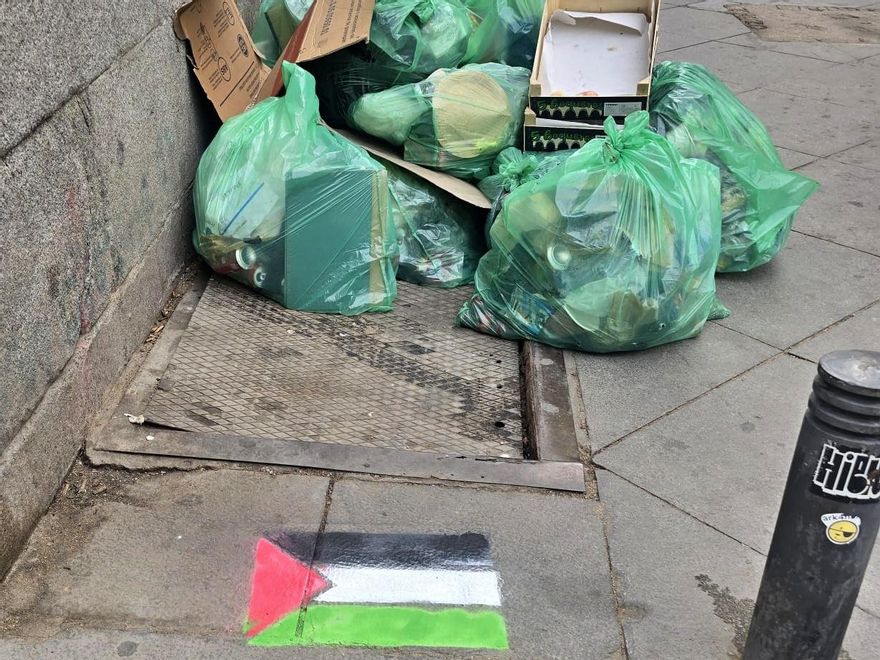 Palestine flag painted next to garbage bags with intention that the area be cleaned by the selur.jpg