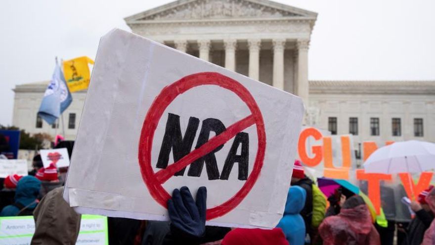 People for gun control laws rally outside the Supreme Court while the court hears oral arguments for the case New York State Rifle and Pistol Association Inc. v. City of New York, New York; in Washington, DC, USA, 02 December 2019.