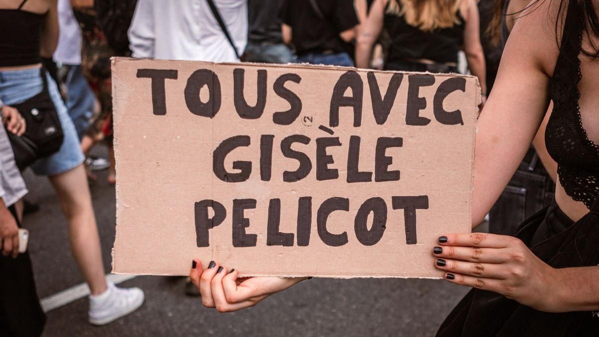 A demonstrator holds a sign reading ALL TOGETHER WITH GISELE PELICOT during a protest against Emmanuel MACRON s power grab, in Lyon, France, September 7, 2024. (Photo by Elsa Biyick / Hans Lucas via AFP) (A demonstrator holds a sign reading ALL TOGETH