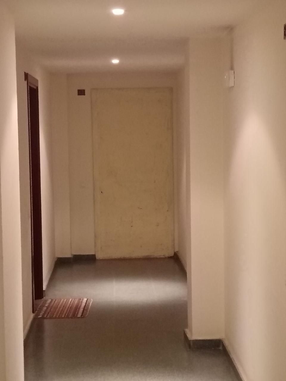Puerta tapiada en un piso de la calle de Jaén
