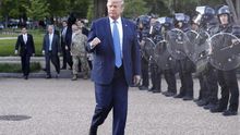 US President Donald J. Trump returns after posing with a bible outside St. John's Episcopal Church after delivering remarks in the Rose Garden at the White House in Washington, DC, USA, 01 June 2020.