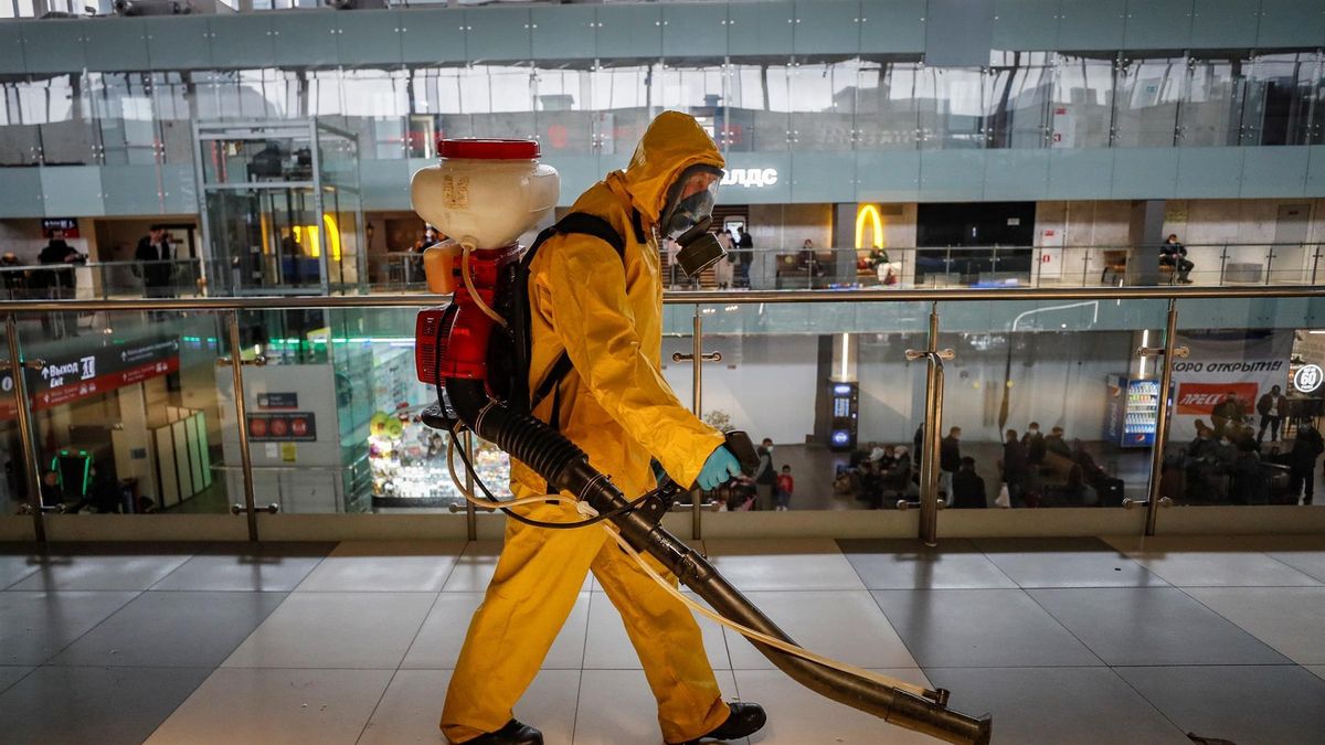 A worker from the Russian Ministry of Emergency Situations wearing a protective suit conducts disinfecting works at Leningradsky Railway Station amid the ongoing coronavirus disease (COVID-19) pandemic in Moscow, Russia, 19 October 2021.