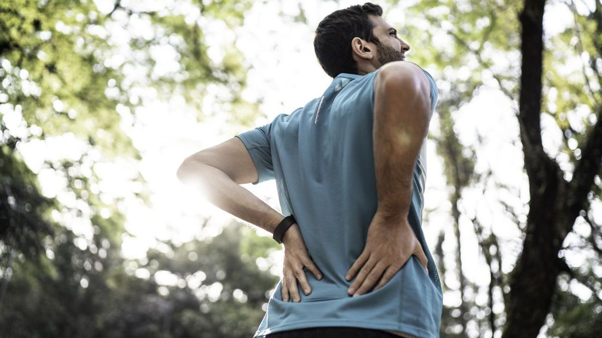Deportista con dolor de espalda