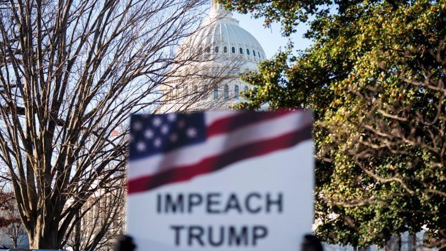 Activists gather at a 'Impeach and Remove' rally to show support for the Congressional impeachment of US President Donald Trump outside the Capitol in Washington, DC, USA, 18 December 2019.