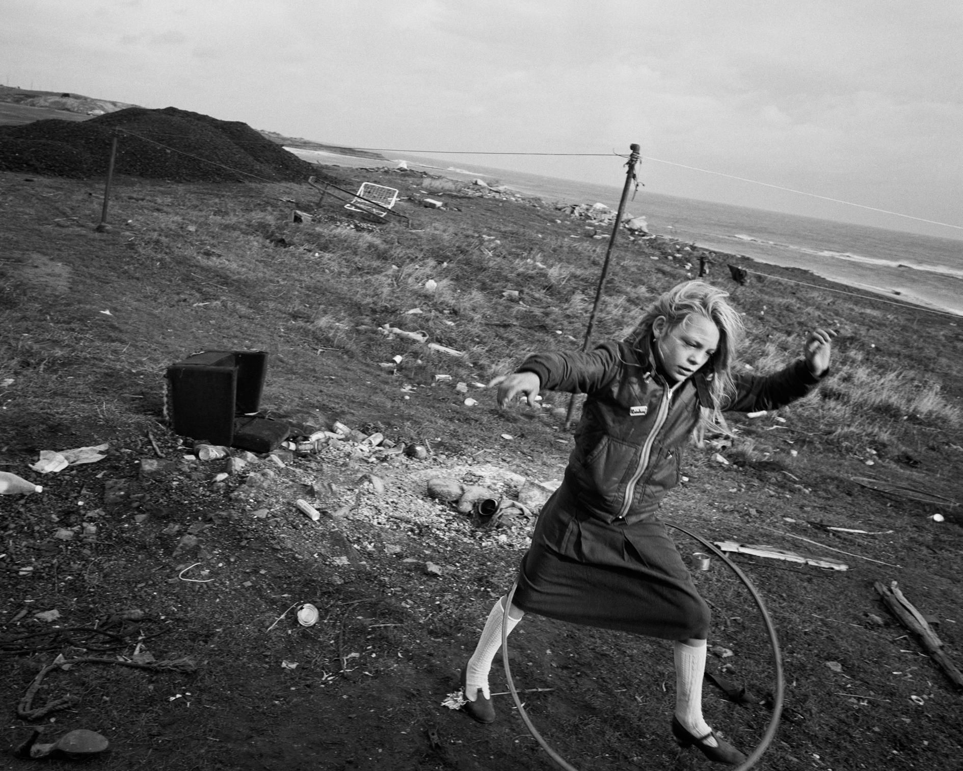 Chris Killip  Helen and Hula-Hoop, Seacoal Beach, Lynemouth, Northumbria, UK, 1984 © Chris Killip