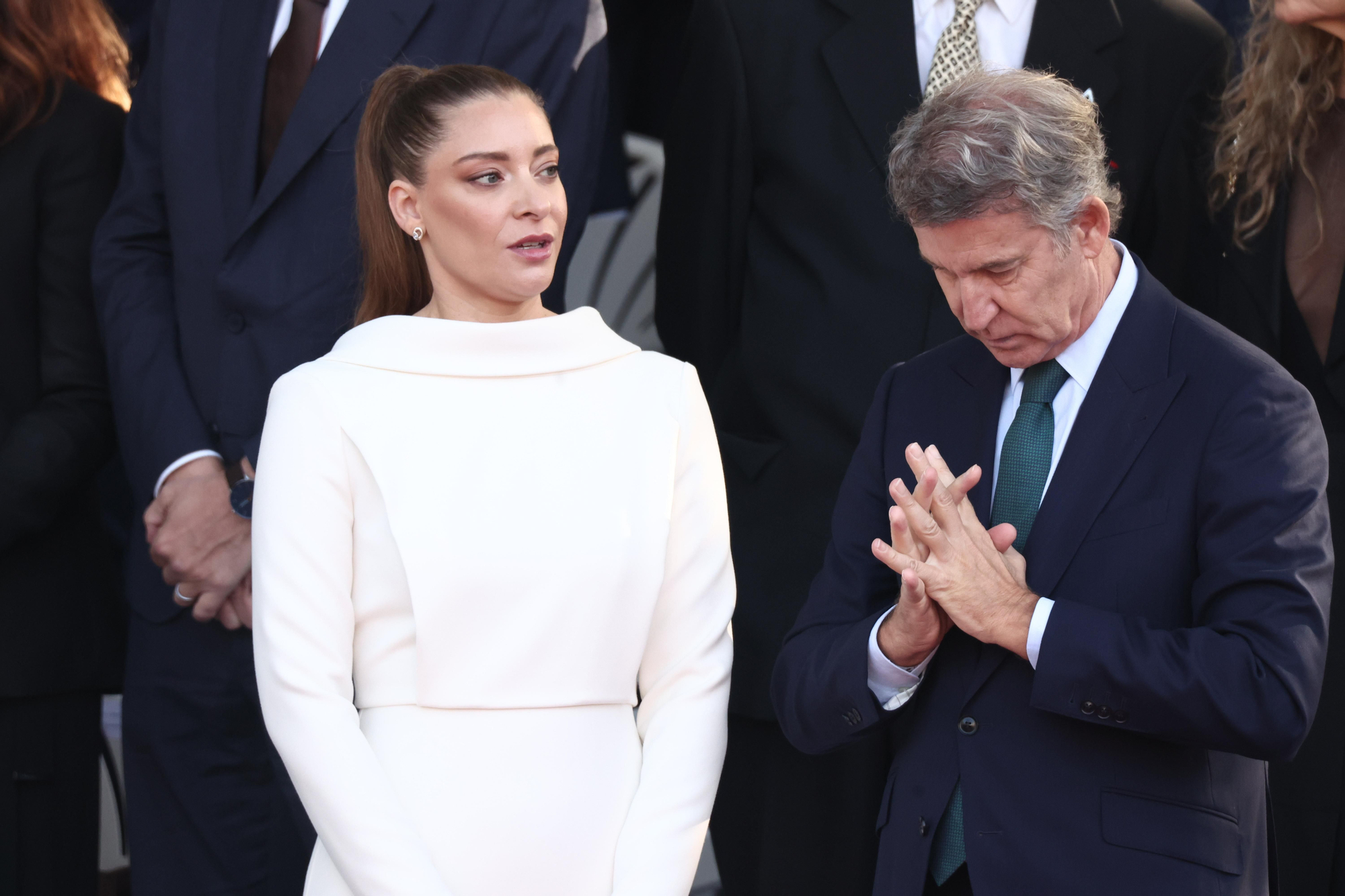 Ester Muñoz y Núñez Feijóo en el desfile del 12 de octubre en Madrid.