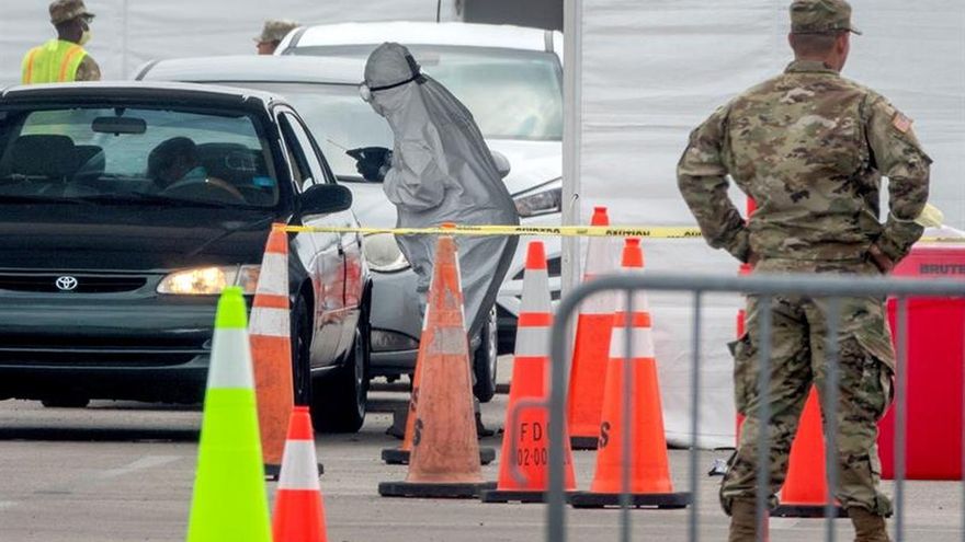 The Florida Army National Guard's members conduct nasal swabs and Coronavirus tests at the testing Location at Hard Rock CafÈ Miami's Super Bowl stadiumís parking lot in Miami, Florida, USA, 13 April 2020.