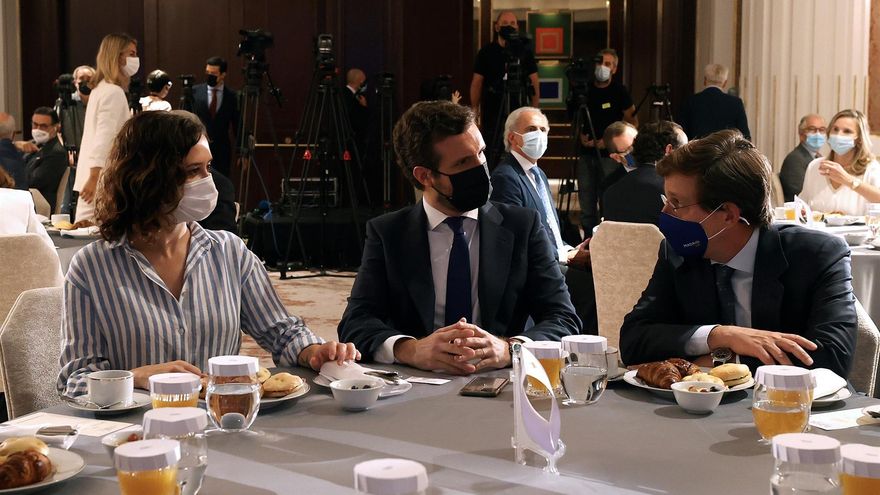 La presidenta de la Comunidad de Madrid, Isabel Díaz Ayuso, el presidente del PP, Pablo Casado, y el alcalde de Madrid, José Luis Martínez-Almeida