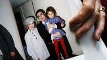 Patricia Wulf, junto a su hija y Plácido Domingo.
