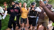 US Secret Service detain a protestor as people gather outside the White House during a protest over the Minneapolis, Minnesota arrest of George Floyd, who later died in police custody, in Washington, DC, USA, 29 May 2020.
