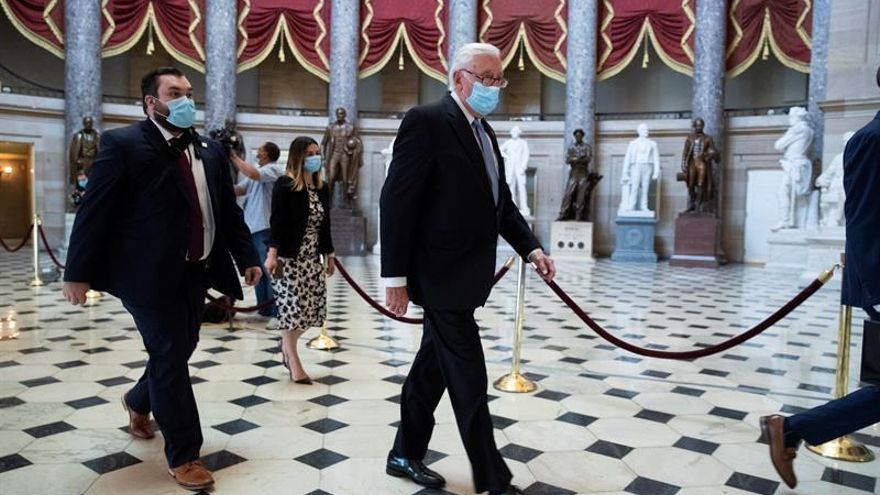 US House Majority Leader Democrat Steny Hoyer (R) walks through National Statuary Hall on Capitol Hill in Washington, DC, USA, 15 May 2020.