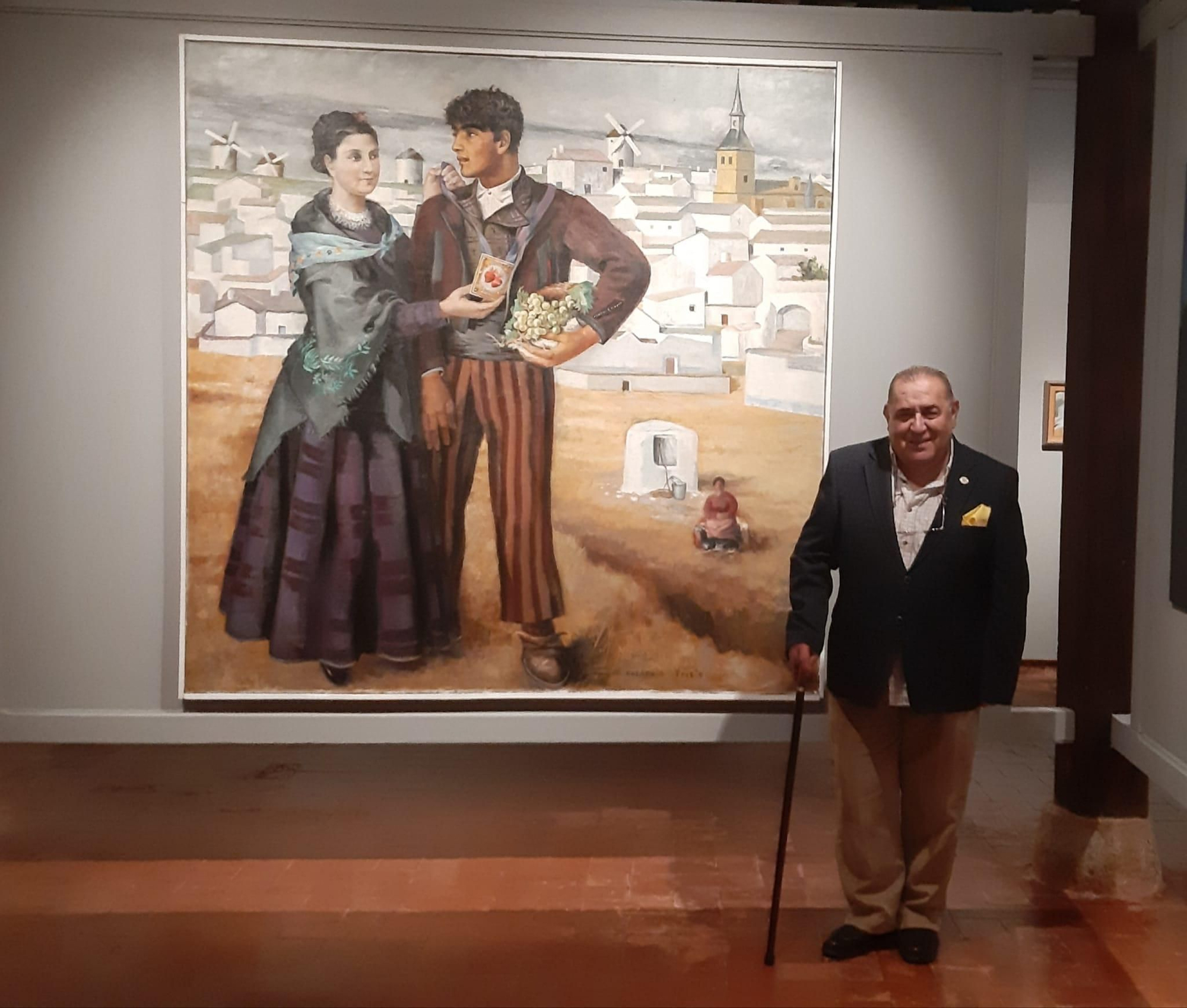 El poeta valdepeñero Joaquín Brotóns, hijo predilecto de la ciudad, junto al cuadro de Greorio Prieto 'Mi madre y yo'.