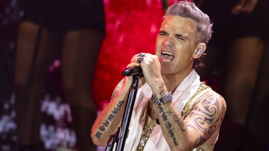 El récord de los Beatles que Robbie Williams está decidido a romper para entrar en la historia de la música