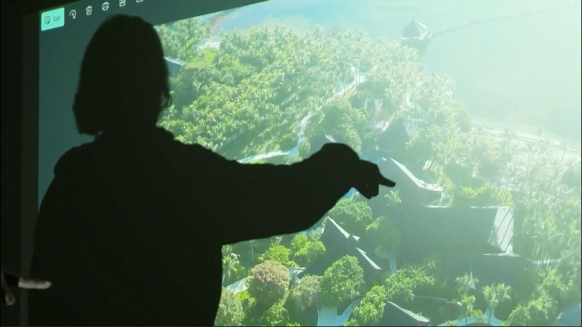 Rebeca señala una visa aérea de Punta Cana