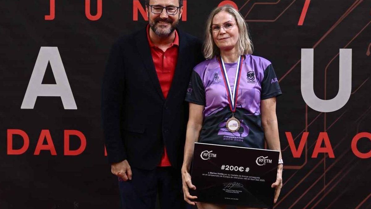 María Vintila junto al presidente de la RFETM, Miguel Ángel Machado.