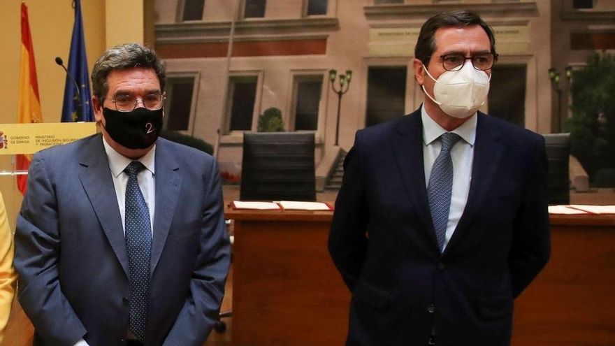 El ministro de la Seguridad Social, José Luis Escrivá, y el presidente de la patronal de empresarios CEOE, Antonio Garamendi.