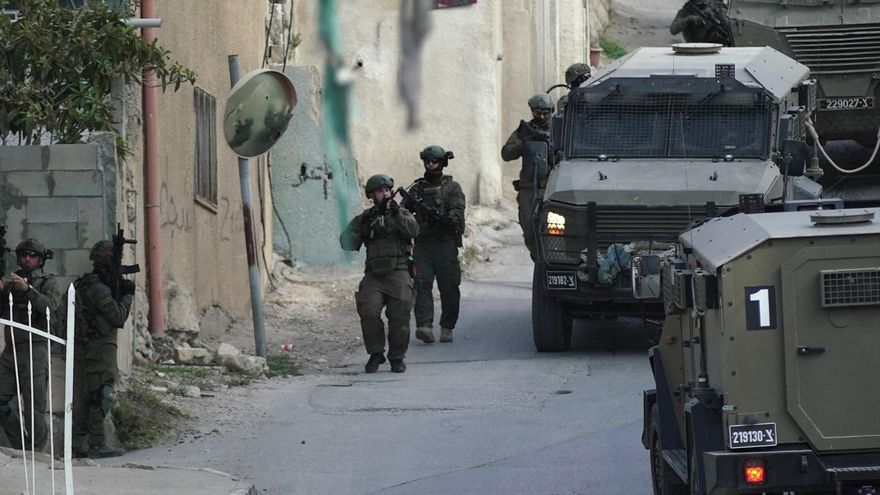 A video clip shows Israeli police shooting and killing two Palestinians with their hands raised