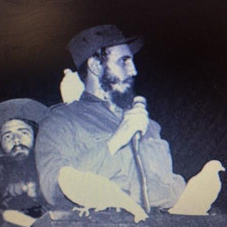 Fidel Castro junto con una paloma blanca mientras entona un discurso