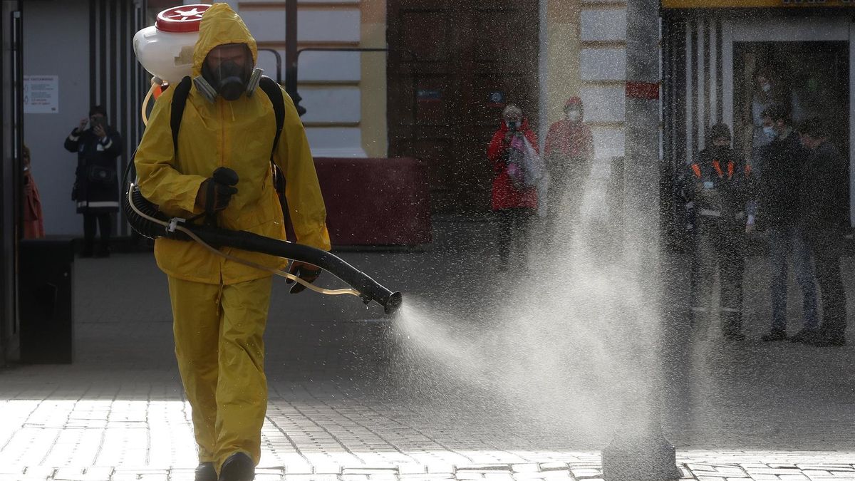 A Russian Emergency Situations Ministry worker sanitises the Savyolovsky railway station as part of the campaign to prevent the spread of the SARS-CoV-2 coronavirus which causes the COVID-19 disease in Moscow, Russia, 26 October 2021.