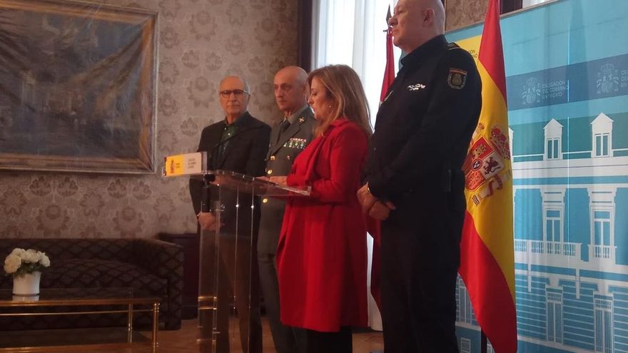 Pintan un lazo amarillo en la fachada de la sede nacional del PP