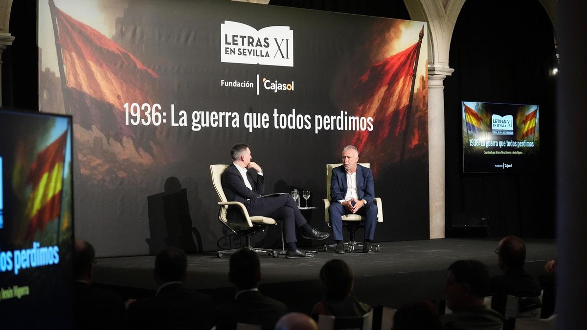 Escolar y Torres en pleno debate en las jornadas de Sevilla.