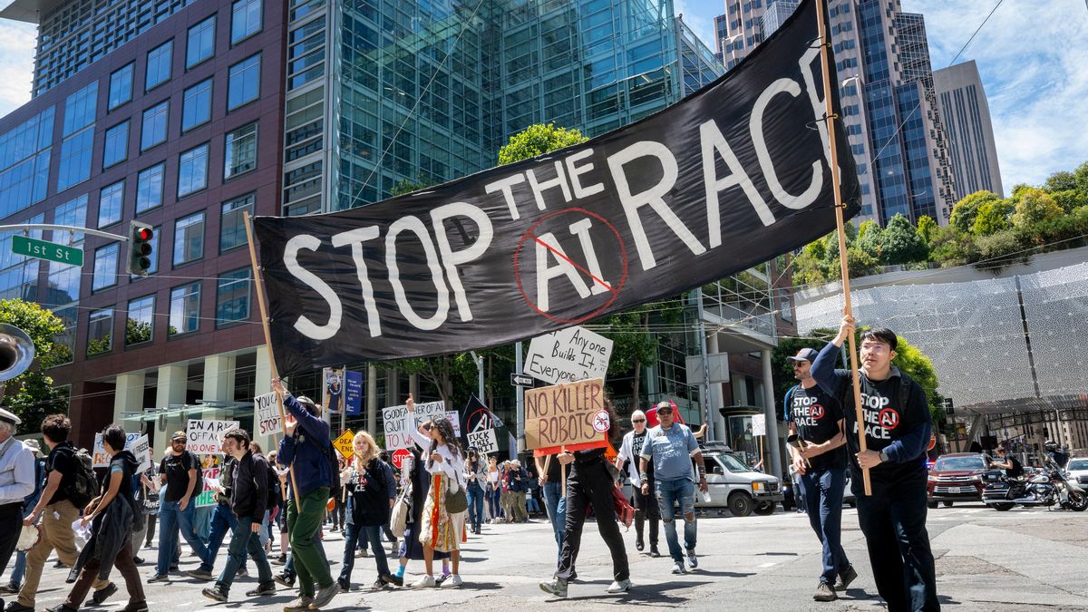 Demonstrators participate in the "Stop the AI Race" protest march in San Francisco, California, on July 11, 2026. The protestors are making stops outside the offices of OpenAI, Anthropic and Google DeepMind. (Photo by Karl MONDON / AFP)