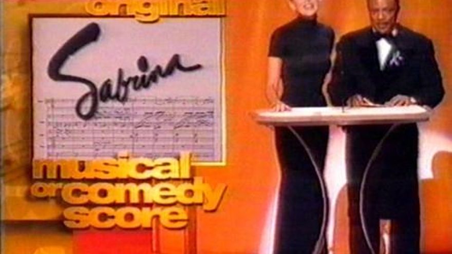 Sharon Stone y Quincy Jones en los Oscar