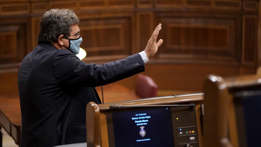 El ministro Escrivá asegura que las "restricciones presupuestarias" obligan a diferenciar las ayudas y evitar el "café para todos" en los ERTE