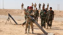 Milicias kurdas se preparan para atacar posiciones del Estado Islámico (EI) cerca de Mosul.