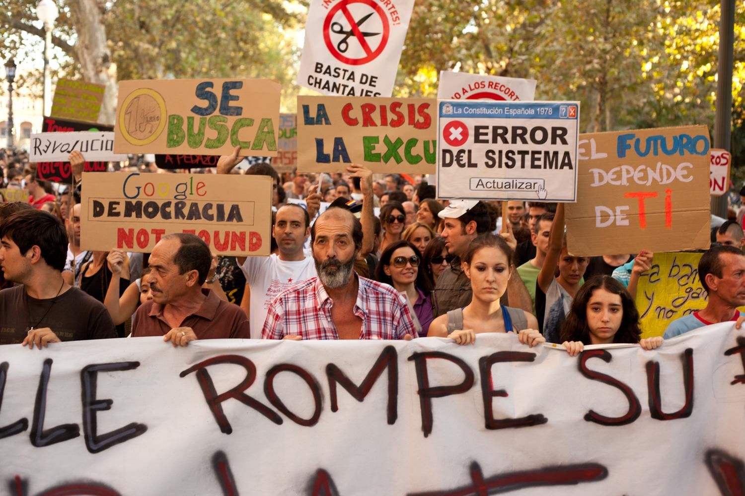 Manifestación del 15O a su paso por la Plaza de España