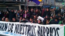 Pancarta de la manifestación Nos echan de nuestros barrios en abril de 2013