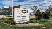 A company sign sits outside the Amazon distribution center in Aurora, Illinois, USA, 13 September 2019.