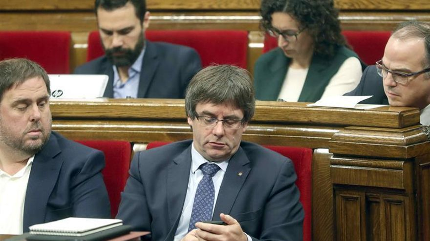 Puigdemont, Junqueras y Turull, en un pleno