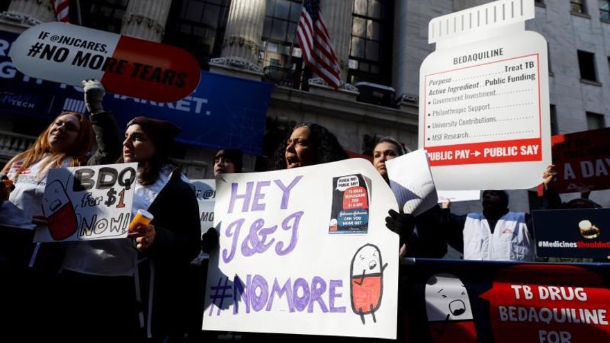 People with group Doctors Without Borders/Medecins Sans Frontieres (MSF) gather for a protest where they called on the pharmaceutical company Johnson & Johnson to lower the cost of the tuberculosis drug bedaquiline for people with drug-resistant tuberculosis to one dollar a day in front of the New York Stock Exchange in New York, New York, USA, 22 January 2020. The drug is being recommended by the World Heath Organization as the main way to treat the drug-resistant tuberculosis but the current price is a barrier to many patients.