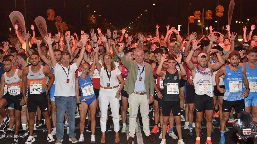 Casi 25.000 personas participan en la Carrera Nocturna del Guadalquivir en Sevilla