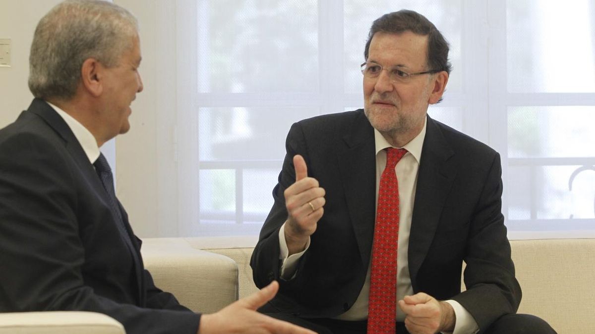 A la derecha, el presidente del Gobierno, Mariano Rajoy.