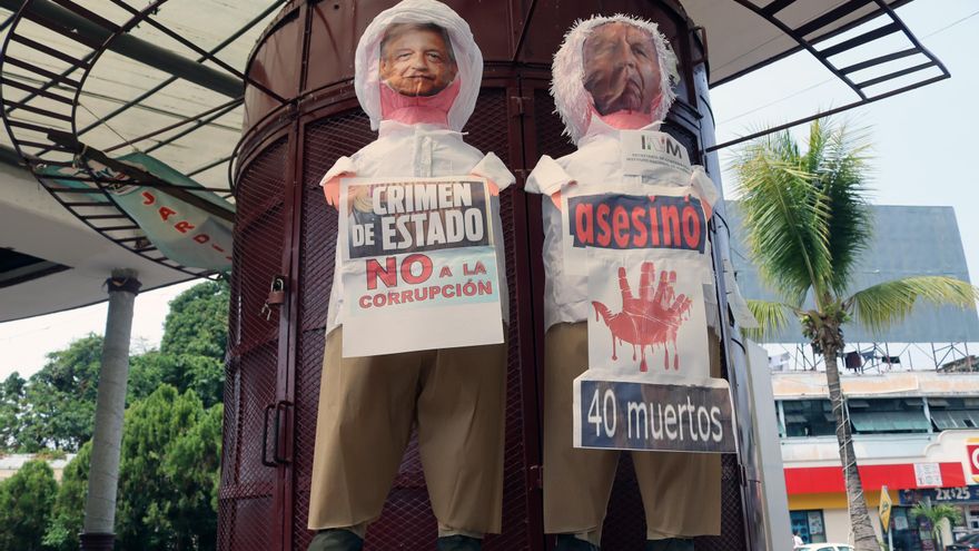 Migrantes en la frontera sur caricaturizan en protesta a López Obrador