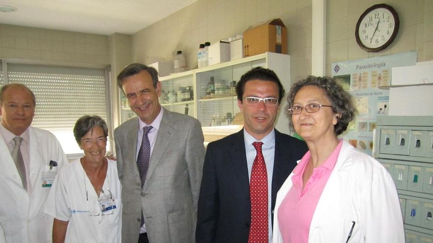 Antonio Burgueño junto al ex consejero de Sanidad, Fernández-Lasquetty.